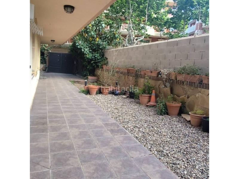 Foto 134317f5-9664-4776-b410-e490455bc646. Apartamento planta baja con jardín y aparcamiento privado en venta en centro en Salou