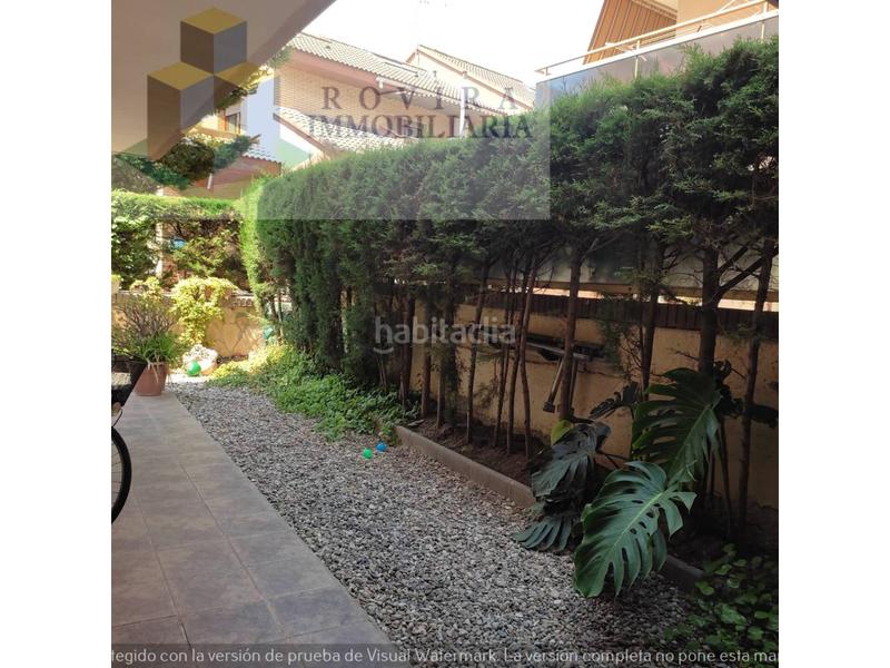 Foto 24df1037-d1c9-4830-a070-bb8c8a475c0c. Apartamento planta baja con jardín y aparcamiento privado en venta en centro en Salou