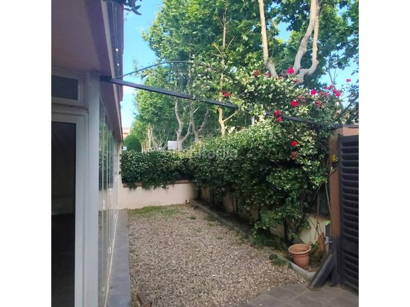 Foto 2661a012-e5bf-486c-a4d4-de005fea7883. Apartamento planta baja con jardín y aparcamiento privado en venta en centro en Salou