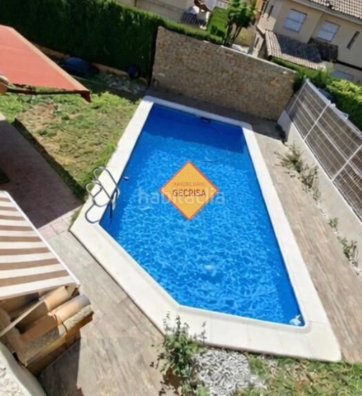 Foto 570336d0-5c54-48ed-aa34-713d95e62b7e. Xalet amb calefacció aparcament piscina a La Cañada Paterna