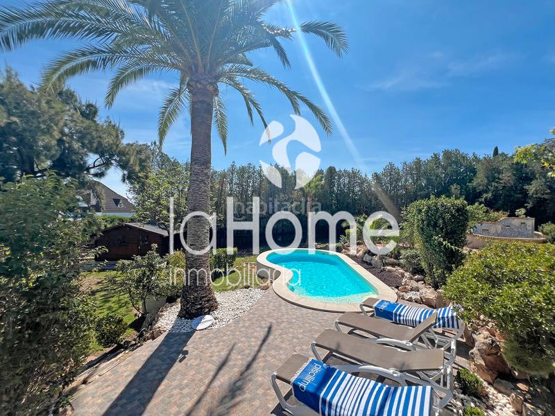 Foto 9d1d7f46-a772-47eb-b8cc-5dca52b0bd94. Chalet avec cheminée chauffage parking piscine dans Chiva