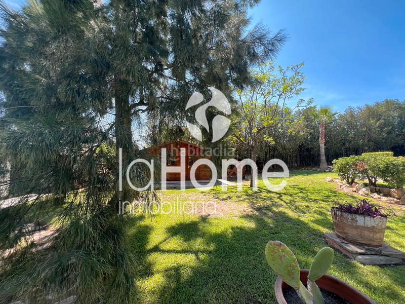 Foto a33e2667-5f54-4d83-8e53-ad747b6aa1b0. Chalet avec cheminée chauffage parking piscine dans Chiva