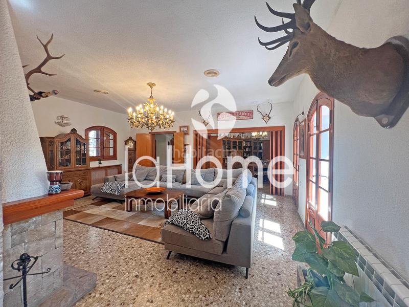 Foto b48dcc85-7d67-408d-80e1-e81ab668f922. Chalet avec cheminée chauffage parking piscine dans Chiva