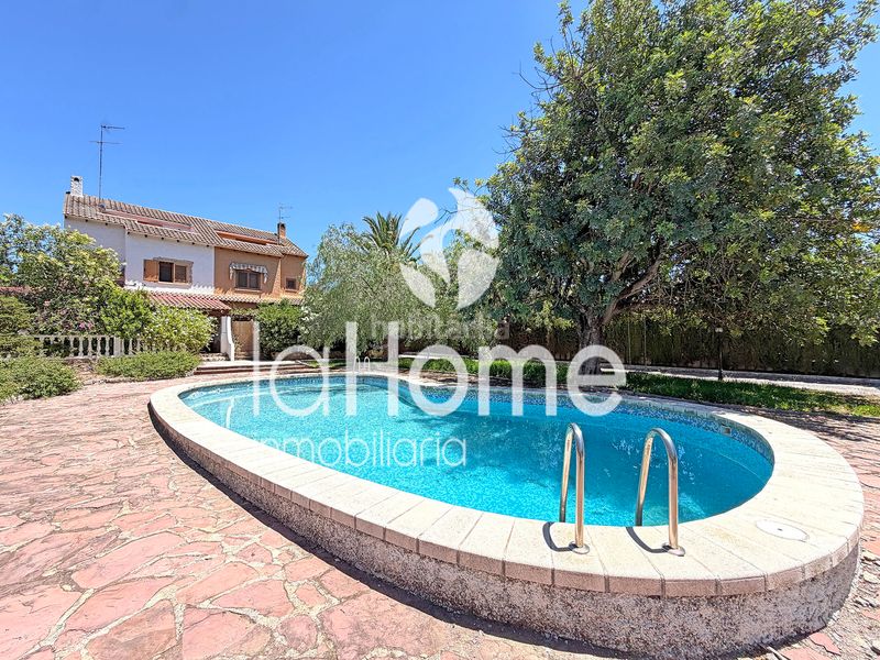 Foto 62ab7500-495e-4a0a-affc-b2687d8e1b3d. Casa aparellada amb xemeneia calefacció piscina a Paterna