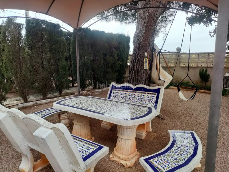 Foto d8e10746-e6fd-4fba-98fb-23b160aeeb0a. Chalet with fireplace parking pool in Montroi / Montroy