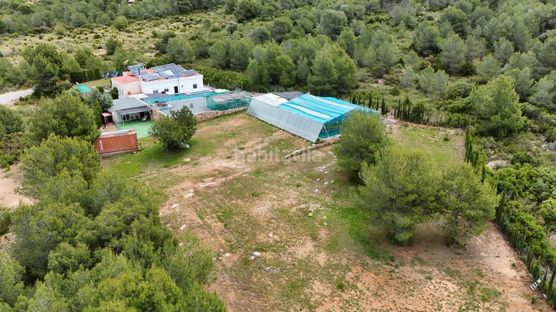 Foto 6a36f90c-9474-461d-836e-6ef363efce0d. Xalet amb calefacció aparcament piscina a Santa Bárbara Llíria