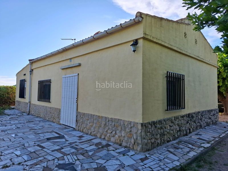 Foto 2b8c7f0a-5e6c-44bd-8327-fc50efe3623d. Chalet  en Agullent