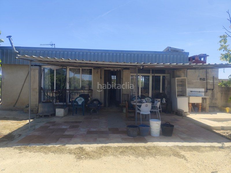 Foto 41abf8ea-fd3b-471e-95f3-c11a38da3be6. Masia amb aparcament a Sueca Sueca
