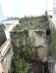 Casa adossada en Centro. Bien ubicada y con huerto!!!