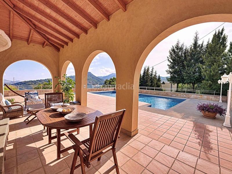 Foto 8e55ed84-dd87-4408-b08c-9055ed99ee9e. Chalet en calle baladre del 4 villa de lujo en el respirall valencia en Alzira