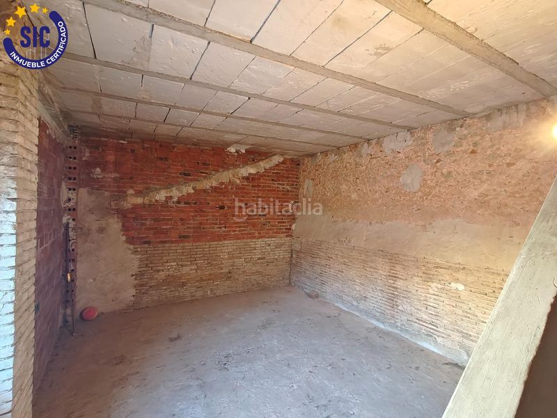 Foto 564f2e3c-9697-41e2-acbb-670c7b89ff20. Casa adossada amb calefacció aparcament a Carcaixent