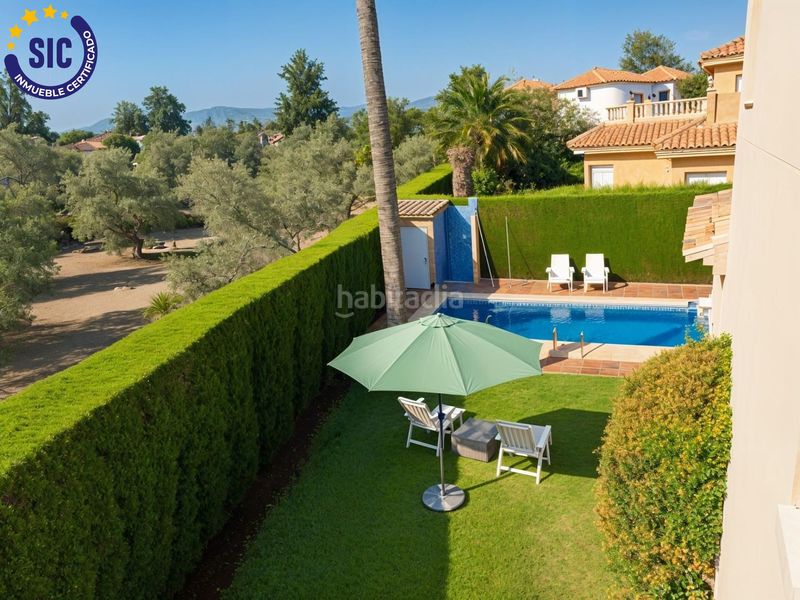 Foto 00ca8005-bde2-4e34-8594-ebc7a38427c4. Chalet espectacular chalet con piscina en exclusiva urbanización nova golf en Oliva