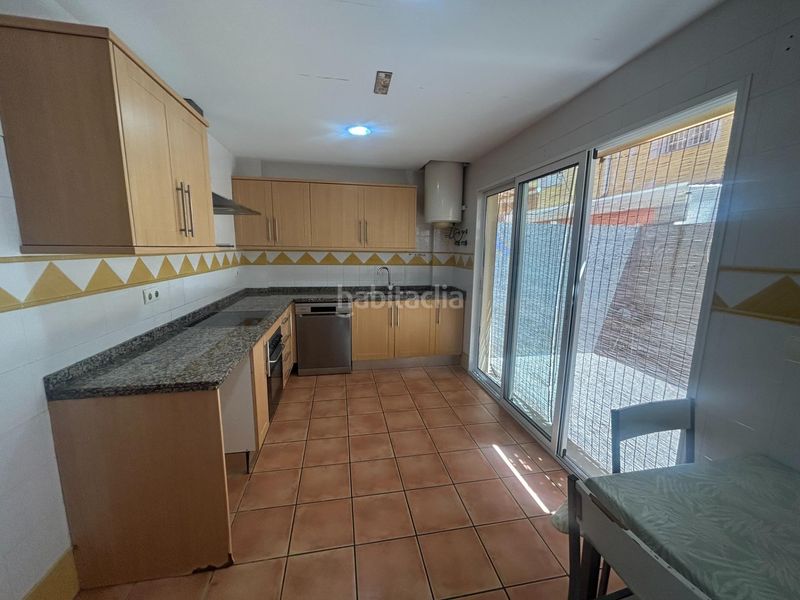 Foto e3933dcc-a177-48ee-ae98-c0495fa05f14. Casa adossada amb calefacció aparcament a Bulevar del Xúquer Cullera