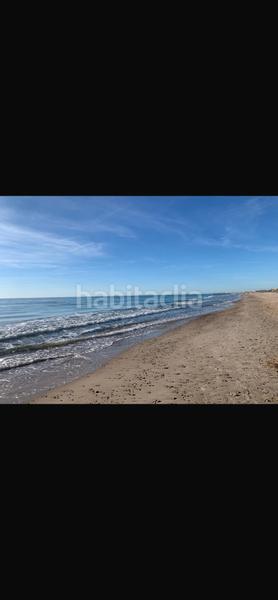 Foto fd1d0067-10e3-480a-b0df-1d8d36fdd19e. Reihenhaus mit parking in Corinto-Almardà Sagunt