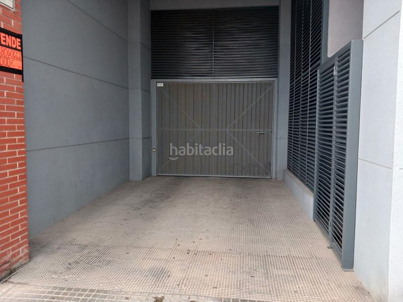 Foto f7d9e5f7-6f3f-4705-97a4-530653d3f090. Autoparkplatz in Corea Gandia