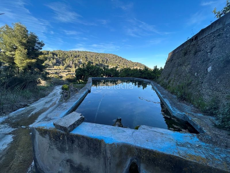 Foto 2fb56fe0-f825-4b97-a7cc-589560da31b4. Masia a Oliva pueblo Oliva