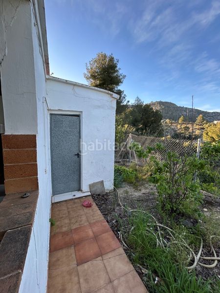 Foto c535f84b-f6b9-42b2-863f-50cc50050000. Masia a Oliva pueblo Oliva