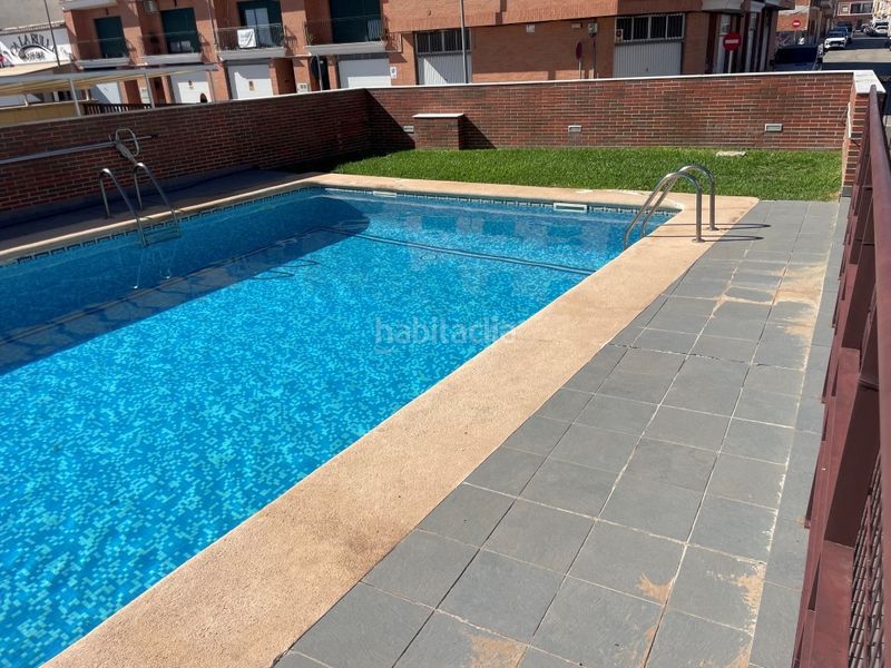Foto 0c0180ed-b485-44e4-ac83-b3dbec67763a. Casa adossada amb aparcament piscina a Bellreguard