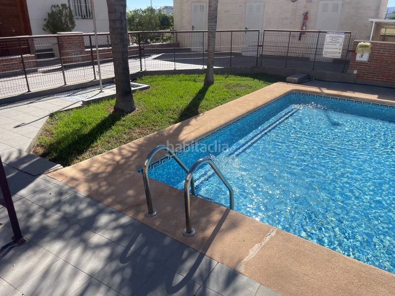 Foto 9f5855bb-c62a-42bf-ae00-1e8d11c7f49f. Casa adossada amb aparcament piscina a Bellreguard