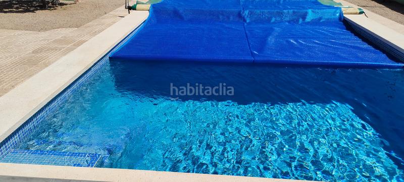 Foto 0e324df2-09f0-473e-bef2-6de0ba87fd5a. Chalet avec cheminée parking piscine dans Platja de Mont-roig Mont-roig del Camp