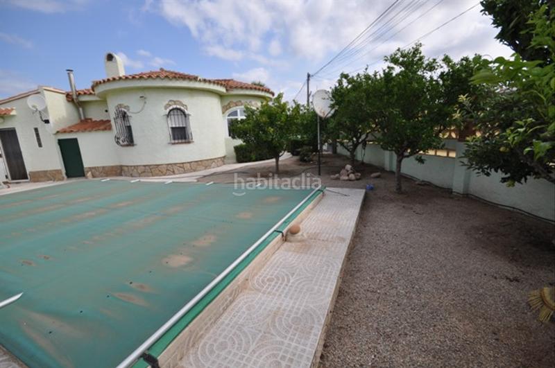 Foto 36e7d337-47ae-4861-967b-b61ecc5c0b12. Chalet avec cheminée parking piscine dans Platja de Mont-roig Mont-roig del Camp