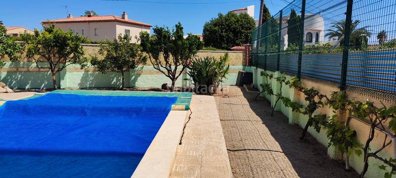 Foto 45341086-7db1-4fcc-91a2-bc21dfb5115c. Chalet avec cheminée parking piscine dans Platja de Mont-roig Mont-roig del Camp