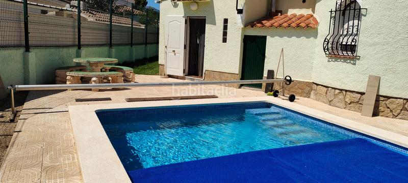 Foto 47476f83-4d52-46d3-863d-1f2845a37da0. Chalet avec cheminée parking piscine dans Platja de Mont-roig Mont-roig del Camp