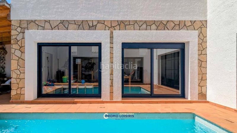 Foto 3be7779a-bb3d-4337-88f5-be889a83c76c. Chalet with parking pool in Costa del Zèfir Miami Platja