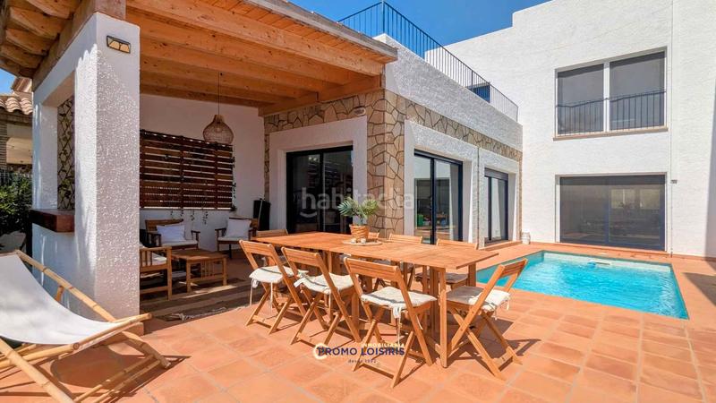 Foto 5a9c70cd-1078-4bac-842c-66c07b816a01. Chalet with parking pool in Costa del Zèfir Miami Platja