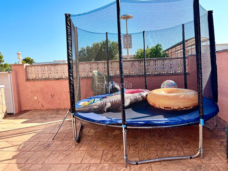 Foto 1e63914b-6fe7-4e0a-bda1-097241279549. Chalet con parcheggio piscina in Costa del Zèfir Miami Platja