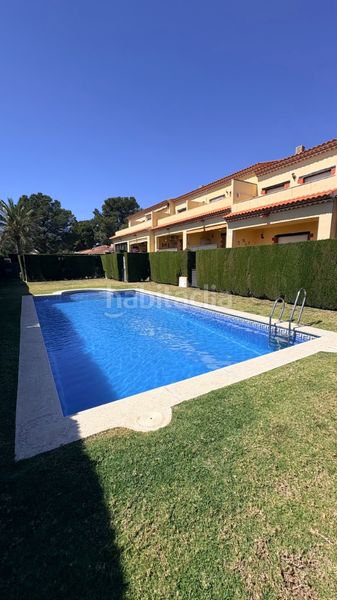Foto b8a91712-9dd5-4b7a-a418-d27c234b1cfb. Casa adossada amb aparcament piscina a Centre Miami Platja