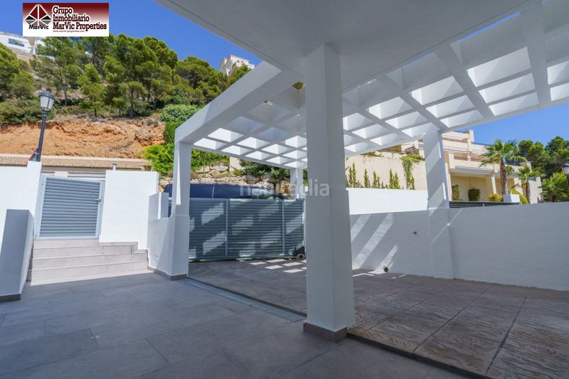 Foto 1a15afd5-87e5-4659-8709-44a8d6bbbbe4. Casa adossada amb calefacció aparcament a Altea hills Altea