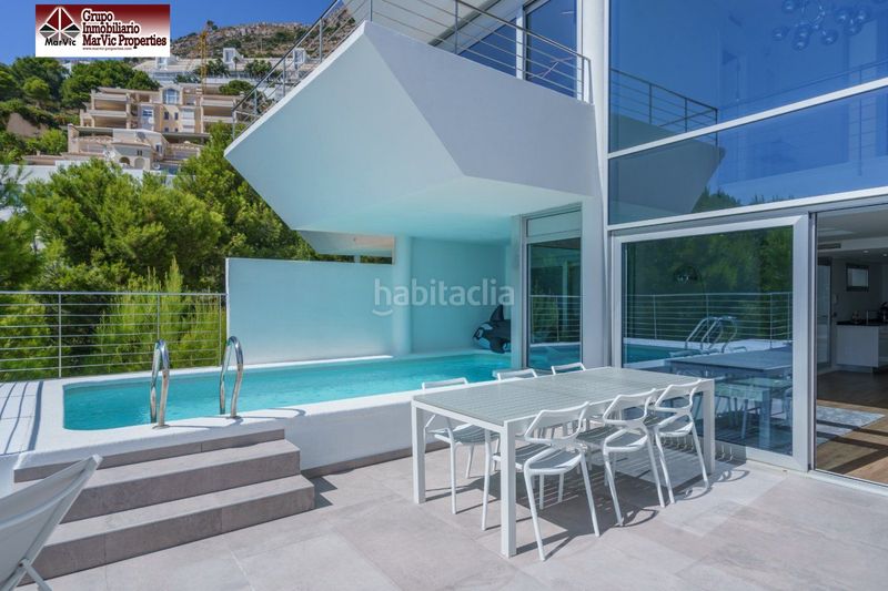 Foto 9fa39adb-33d1-42c5-be24-845650c5c0df. Casa adossada amb calefacció aparcament a Altea hills Altea