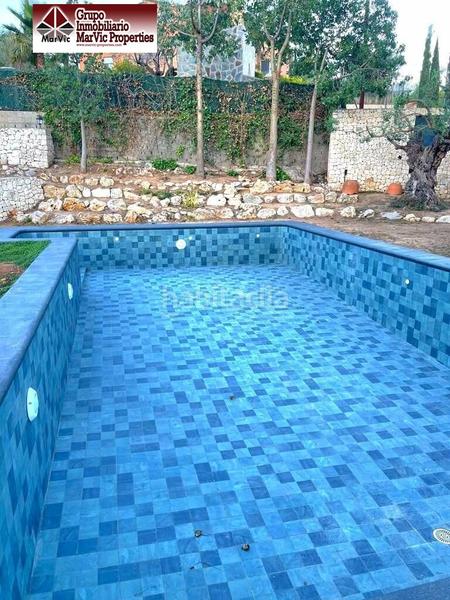 Foto 6bac2d9a-75e3-4b00-bd87-46fd562d78f7. Chalet con riscaldamento parcheggio piscina in Urbanizaciones Gandia