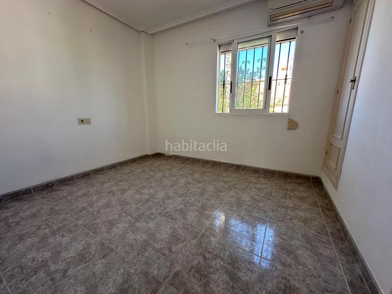 Foto a64910cd-bc75-4b5f-9cb7-02dd100dbf17. Casa aparellada amb calefacció aparcament piscina a Benidorm