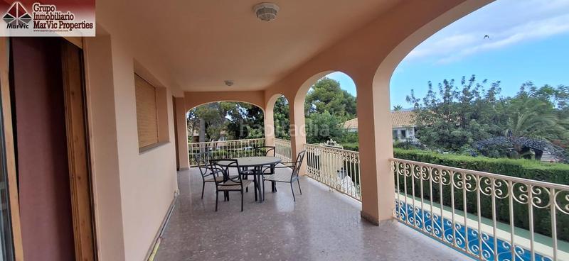 Foto f0da737b-7d02-4414-bc21-e11bc229b917. Chalet con riscaldamento parcheggio piscina in Urbanizaciones Benidorm