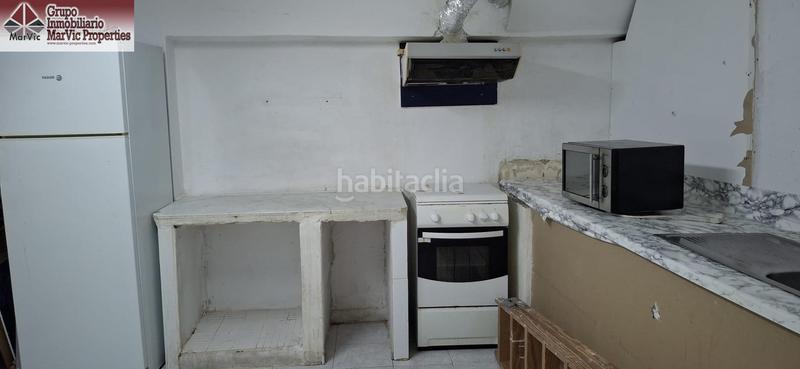 Foto d77390a4-1ef8-4b40-b1e6-30dbe7245069. Local comercial amplio local comercial con posibilidad de cambio a vivienda en Benidorm