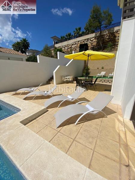 Foto 19619d3e-518c-4985-98de-c8cdf56c3e24. Chalet with parking pool in Sierra Helada Benidorm