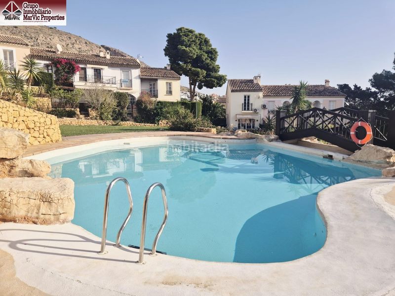 Foto 46904812-1125-4113-b3f0-30eb3c74f4e6. Casa adossada amb piscina a Golf Bahía Finestrat