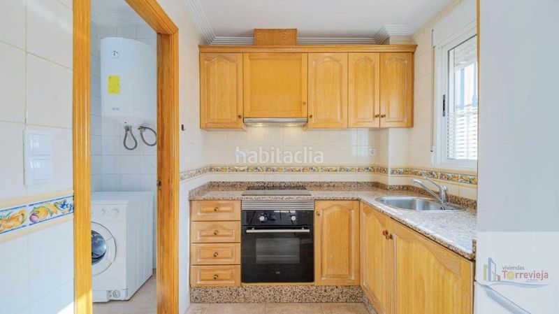 Foto b3dada04-dbc0-4b81-96da-159738e953ed. Casa amb calefacció piscina a Los Balcones y los Altos Orihuela