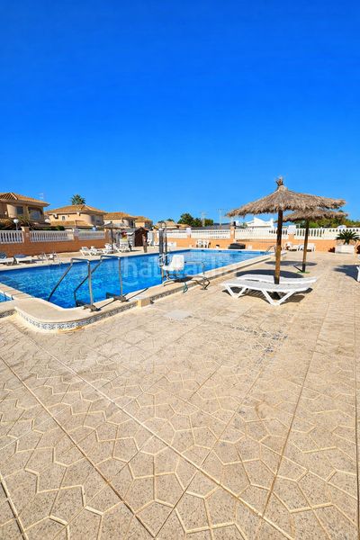 Foto bc1b83af-f7e9-42ef-8a5b-6dabd2f3f970. Casa amb piscina a Los Balcones-Los Altos Torrevieja