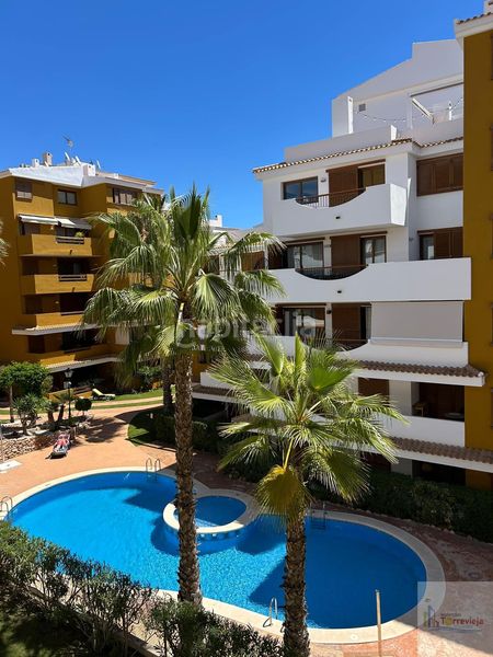 Foto 244ac1ab-3d29-4174-bf0b-3a12a27e1d7d. Apartament amb calefacció aparcament piscina a Punta Prima Torrevieja