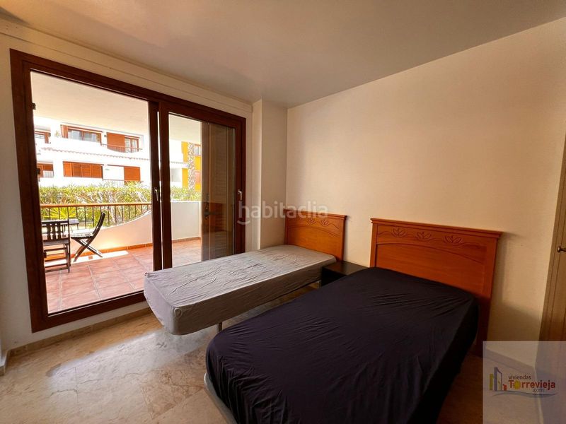 Foto 586b0515-2363-499c-9ff6-125c6855bcf7. Apartament amb calefacció aparcament piscina a Punta Prima Torrevieja