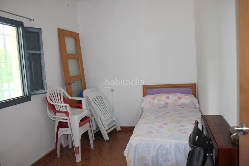 Foto c6e2e655-d7f3-4cb6-ac0c-ee68636b3a90. Chalet  con amplia parcela en suelo rústico en Casinos