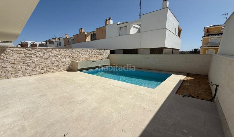 Foto 04eb7e40-4e69-453b-9bbe-b70dc1384419. Towny house with parking in Los Secanos Guardamar del Segura