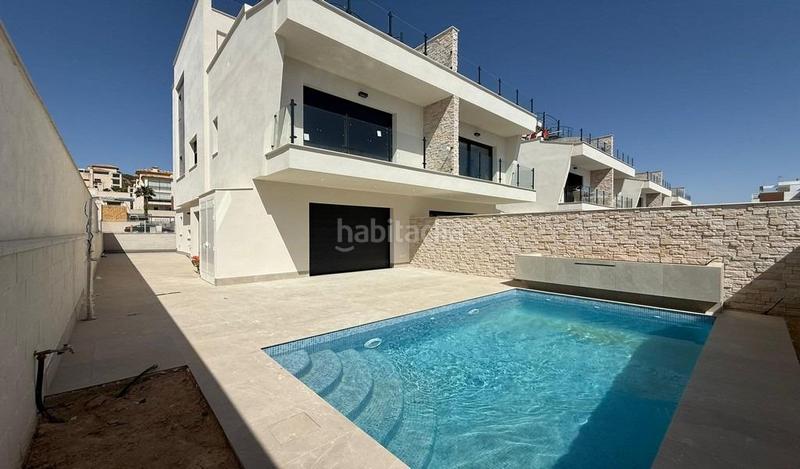 Foto 074557ea-17ea-4f8f-afc6-8eef01f444c8. Towny house with parking in Los Secanos Guardamar del Segura