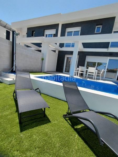 Foto 44321919-e7b6-4d7e-b59d-d3165afefddd. Chalet with heating parking pool in Monte y Mar Santa Pola