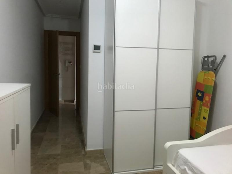 Foto f81ce1ae-5579-4b30-971c-ae0ea4d3c46c. Piso  seminuevo con piscina, garajes y terraza en Elche / Elx