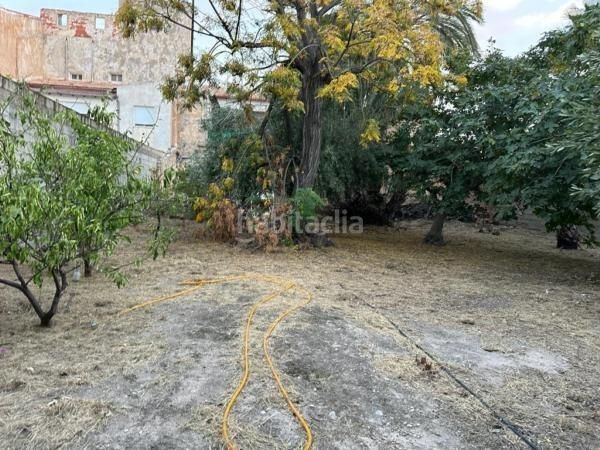 Foto b186b29f-5844-4ebf-acf3-c13731ecc847. Casa adossada a Novelda