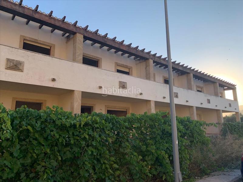 Foto 471a4b33-f4dc-4f4e-aaf2-329bce72cf01. Edificio  en construccion detenida de 10 viv. adosadas en Parcent